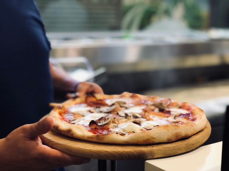 Round table pizza menu showcase