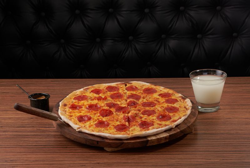 King Arthur's Supreme pizza with gourmet toppings
